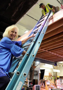 Diana ascends ladder